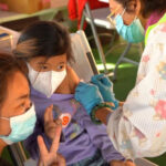 ชุมชนไทย ‘แอลเอ’ หวั่นโควิดสายพันธุ์ ‘โอมิครอน’ รณรงค์วัคซีนกระตุ้น